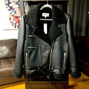 NWT. Steve Madden black faux leather and Sherpa lined bomber jacket.